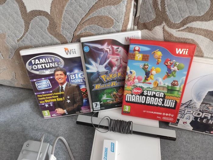 Wii with Mario Bros, Pokemon, Price of Persia