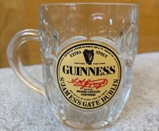 Guinness "thumbprint" dimpled tankard mug featuring the iconic "Extra Stout" label