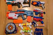 Large set of Nerf blasters and others.
