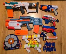 Large set of Nerf blasters and others.