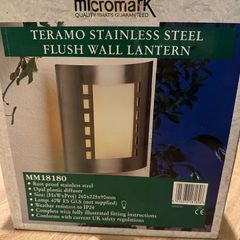 Stainless steel wall lantern. Never used.