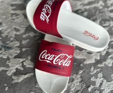 Coca-Cola flip-flops, size UK 9/10, like new.