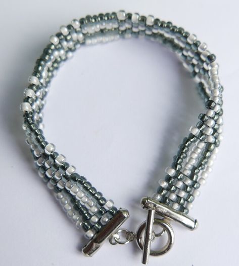 Kumihimo Seed Bead Bracelet: Black, White,  Silver Clasp