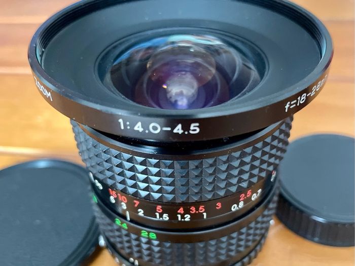 Olympus OM fit Siirius 18-28mm F/4.0-4.5 lens mint