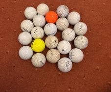 22 mixed golf balls