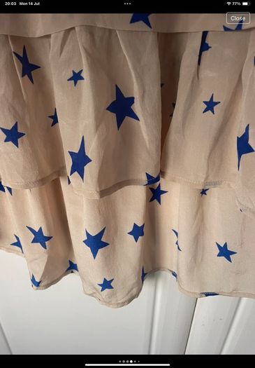 top bnwt 100% silk peplum top Pyrus brand cream with blue star pattern small