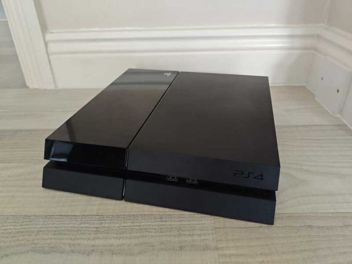 PlayStation 4 with 2 DualShock Controllers
