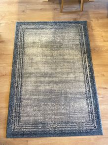 Next Rug with navy border just been cleaned