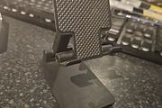 Folding desktop phone stand