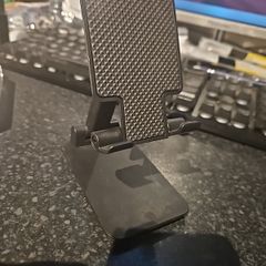 Folding desktop phone stand