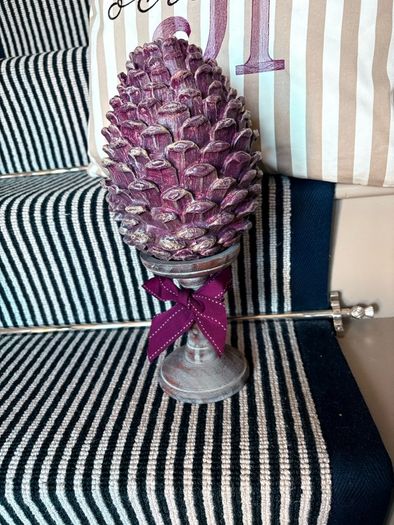 New bespoke oversized autumn Pinecone on distressed wood base in mulberry
