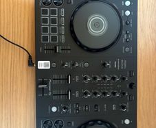 Pioneer DJ DDJ FLX4 with headphones