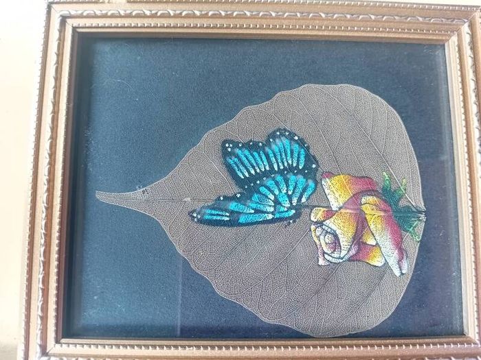 A pair of Vintage handpainted Peepal Leaf Paintings