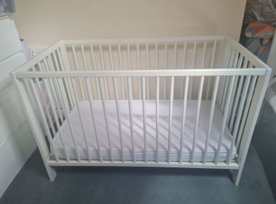 Cot, mattress and bedding