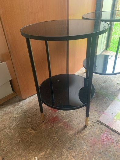 Two black glass tables