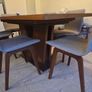 Dining table & 6 chairs - L175cm x W100cm extendable to 275cm. Brushed stainless steel central base with 6 Skovby Walnut chairs. Perfect condition. Downsizing. Image 2