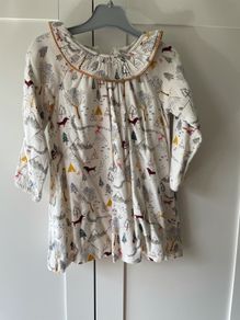 Marks and Spencer cream dress with winter scene