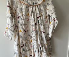 Marks and Spencer cream dress with winter scene