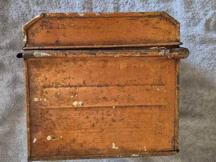 Small vintage metal trunk.