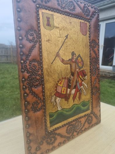 Vintage painting on the skin of a medieval knight