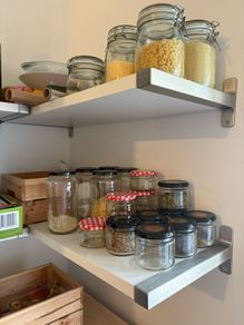 Wall shelf with brackets