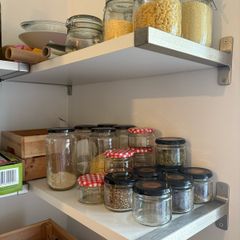 Wall shelf with brackets