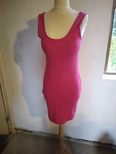 Stretch Dress,figure hugging.Size 12 Brand New.