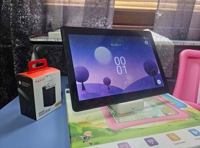 Kids Tablet is like a new 10.1 inch Android 13 EagleSoar + Brand New Havit Portable speaker + Pink Gell Case comes with its and also usb charging