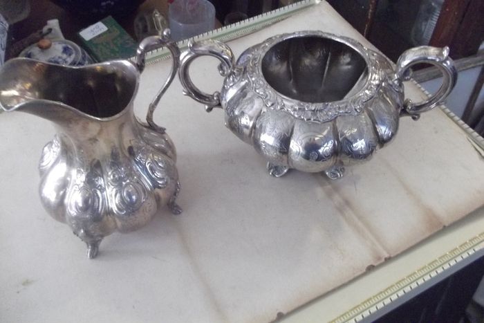 two antique silver plated items a  milk jug and suger bowl c 1860