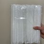 A box of Paper cups and a box of straws Image 4