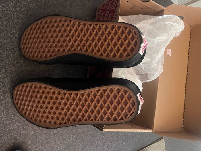 Brand new black Vans in the box