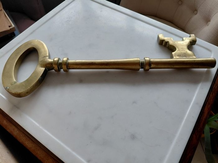 Antique solid brass ornamental key 35cm in length