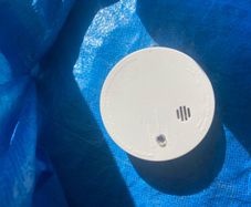 New unused smoke alarm with battery