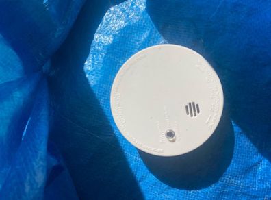 New unused smoke alarm with battery