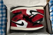 Nike Air Jordan 1 Mid "Chicago Black Toe" sneakers. The iconic black, white, and red colorway is inspired by the original 1985 "Chicago" release