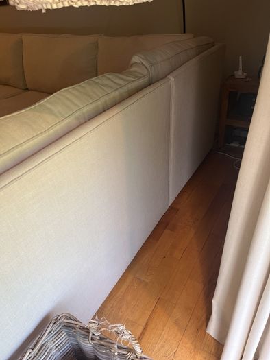 large L shaped cream sofa