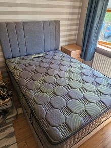 grey double bed with new mattress 300 for both with drawers on side