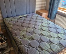 grey double bed with new mattress 300 for both with drawers on side