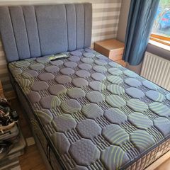 grey double bed with new mattress 300 for both with drawers on side
