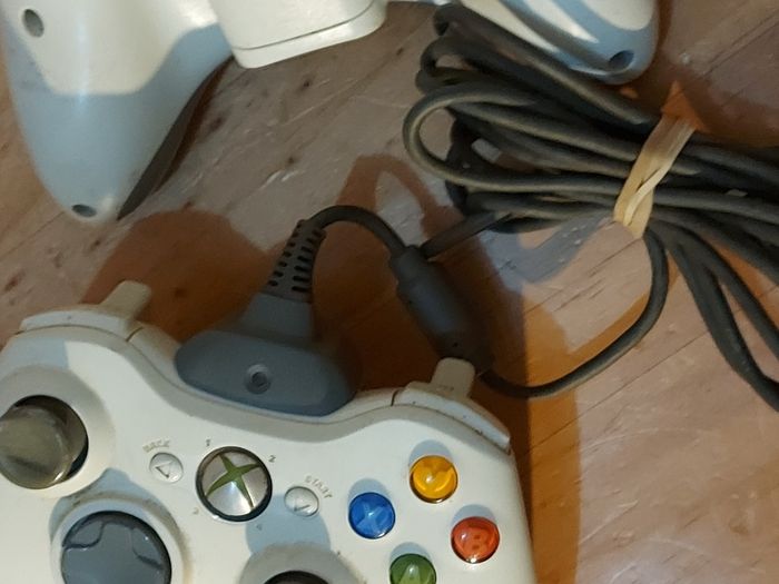 XBOX 360, with Power Charger, 2 Controlllers with Charger, wifi ariel, Communication cable, all in excellent cosmetic condition, not tested