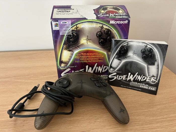 Mixed PC gaming lot: official Sidewinder controller and games, incl. big-box Theme Park World