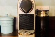 Nespresso Citiz Krups coffee machine with milk frother.
