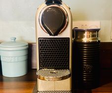 Nespresso Citiz Krups coffee machine with milk frother.