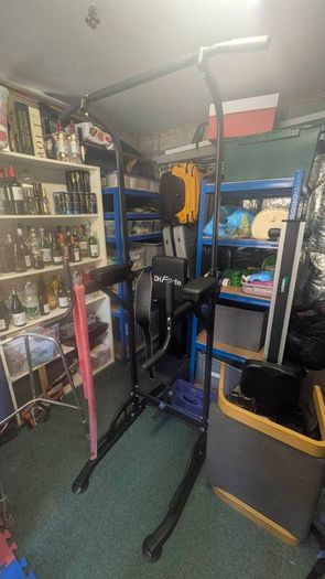 gym equipment - barbell - squat rack - dumbbells