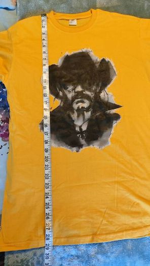 Lemmy from Motorhead t-shirt. Amazing print Brand new.It's a medium on the tag but it would be more of a small to a slim medium.