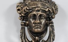 Bronzed cast iron door knocker