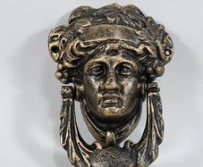 Bronzed cast iron door knocker
