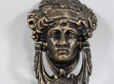 Bronzed cast iron door knocker