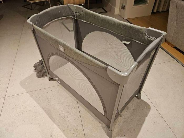 Joie travel cot with bassinet and extra mattress