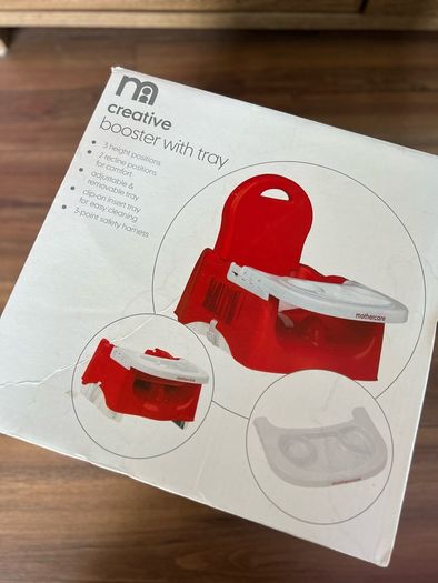 High chair / booster seat with tray.